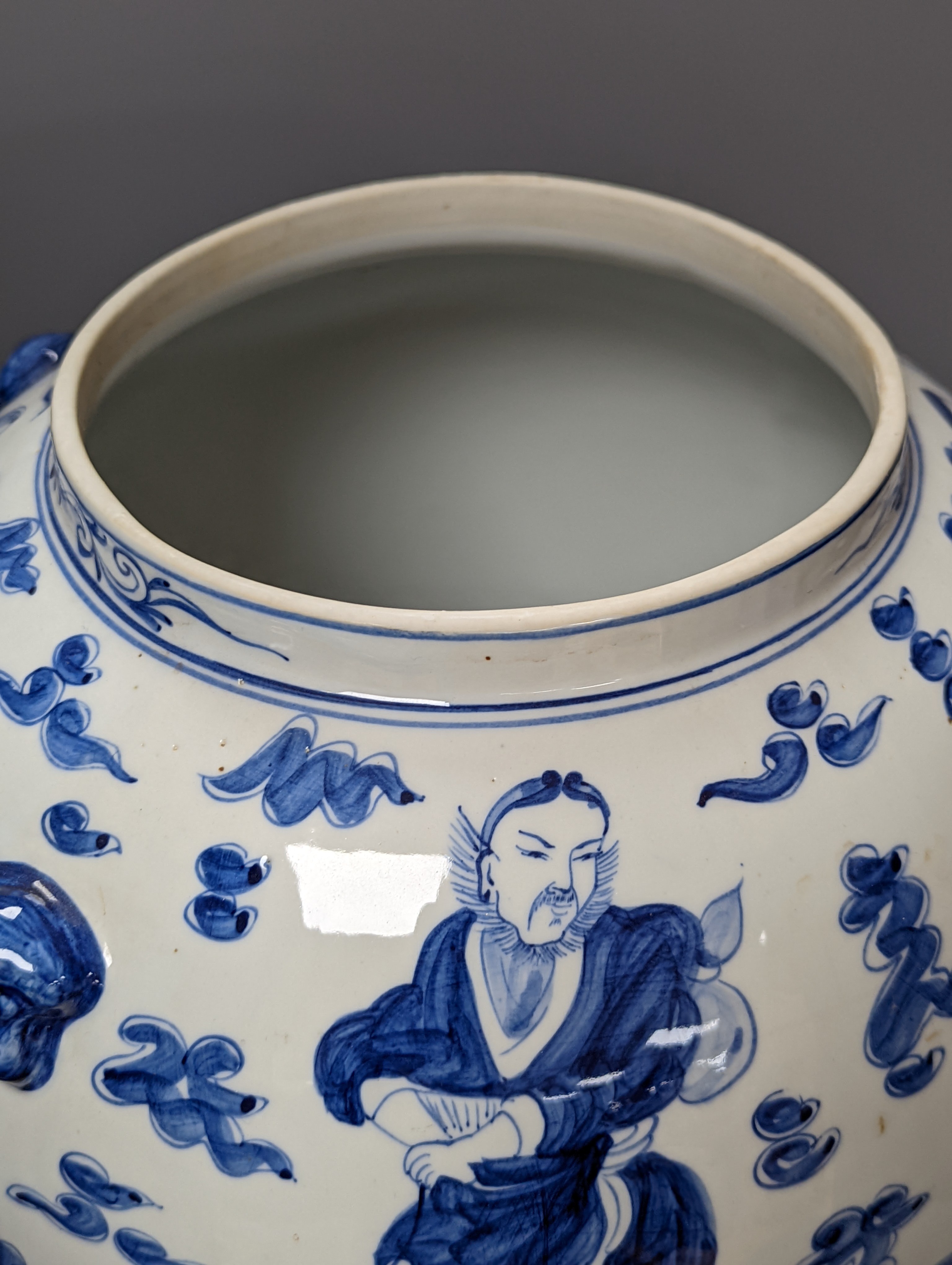 A large Chinese blue and white baluster jar and cover and matching vase, tallest 55 cms high.